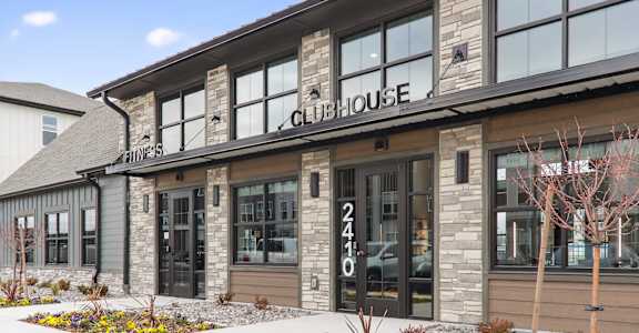 The front of a building with the number 2410 on it.at The Logan Luxury Apartments, Nampa, ID, 83651