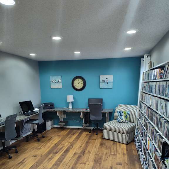 Business center with books, computers and printer