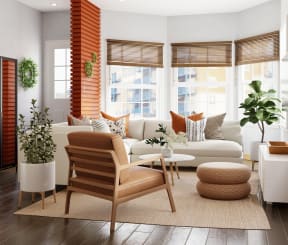 a living room with white furniture and a large window