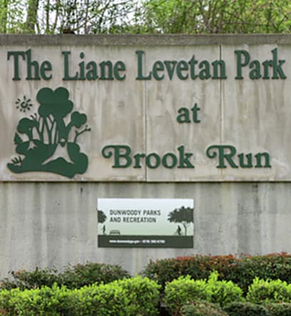 A sign for The Liane Levetan Park at Brook Run.