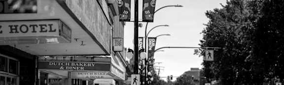 Storefronts on a city street.