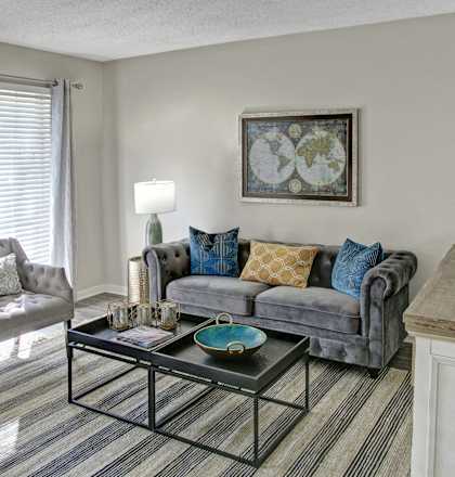 a living room with a couch and a coffee table
