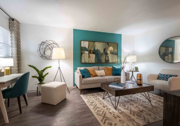 a living room with a couch and a table