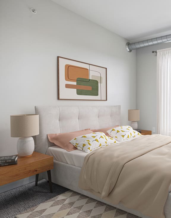 a bedroom with a bed and a large window