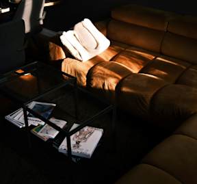 A brown leather couch at Twenty Fair Apartments, Connecticut