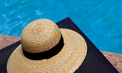 Sunhat by a pool