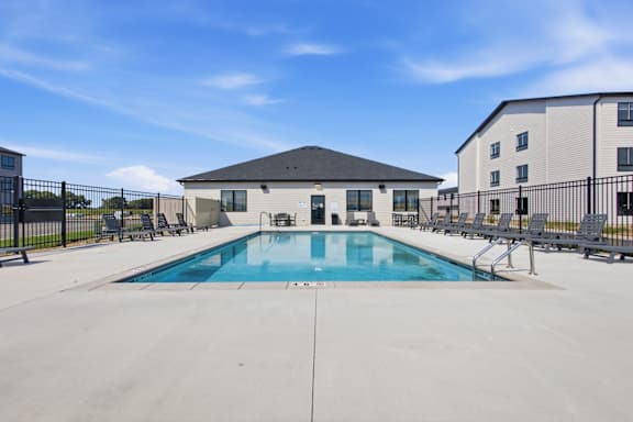 A swimming pool in a sunny day.