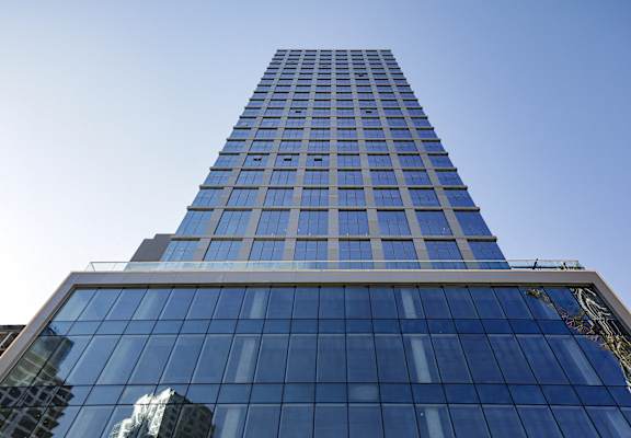 looking up at the south facade of one madison plaza in downtown at The Paxton, Brooklyn, 11201