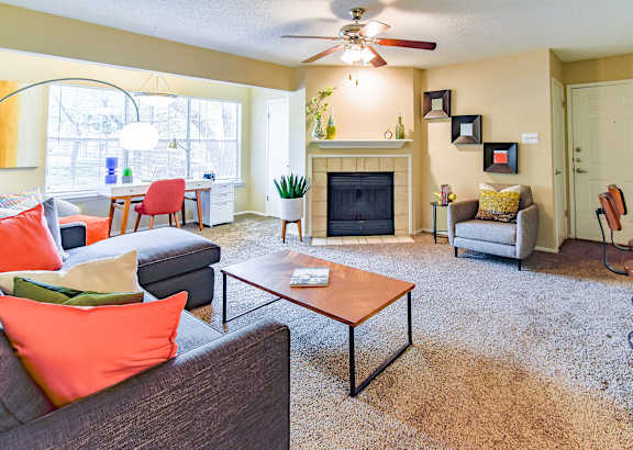 a living room with a couch and a coffee table at Riverset Apartments, Memphis, 38103