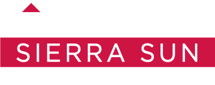 a sign that says madison sierra sun apartment homes