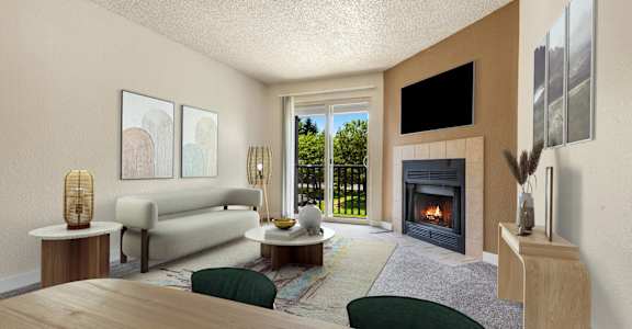a living room with a fireplace and a table and chairs at Eagles Landing Apartments, Everett