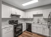 Thumbnail 10 of 25 - Gourmet Kitchen at Lifestyle at Shreveport Apartments, Louisiana
