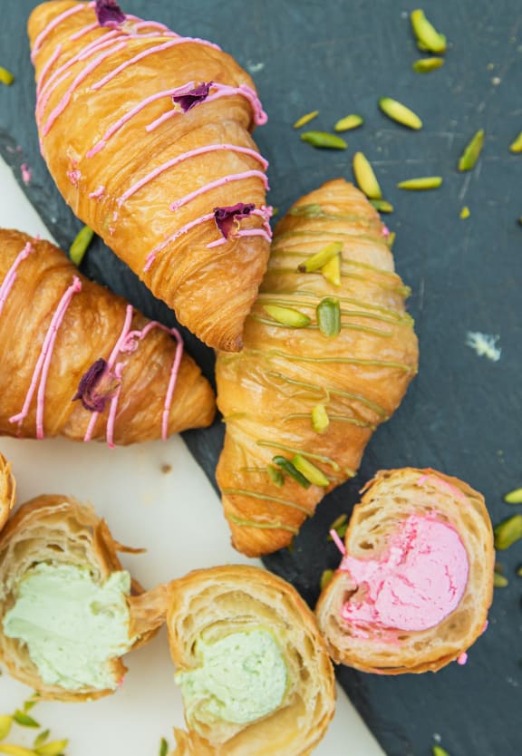 a picture of croissants and ice cream on a table