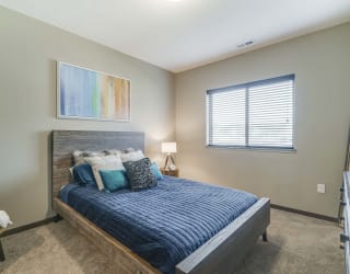 Master bedroom at WH Flats new luxury apartments in south Lincoln NE 68516