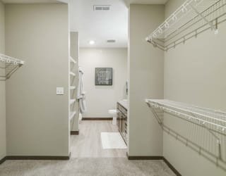 Walk in closet in master bedroom at WH Flats new luxury apartments in south Lincoln NE 68516