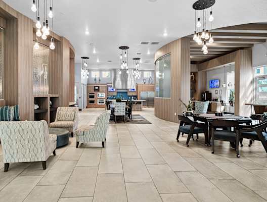 A modern waiting room with a variety of seating options.