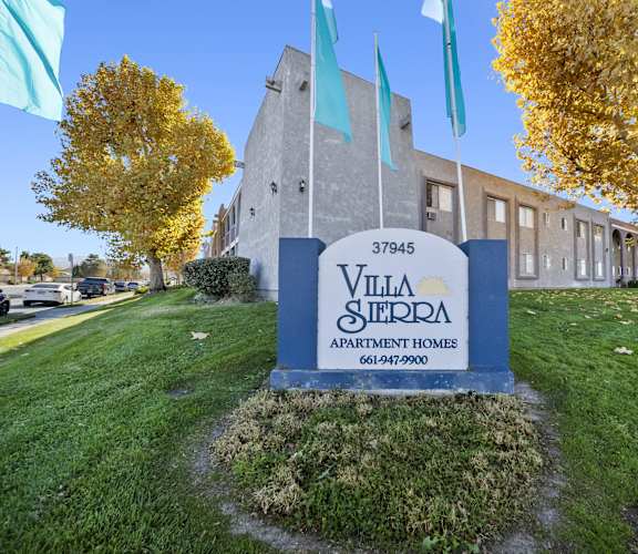 Villa Sterpa apartment complex with a sign in front.