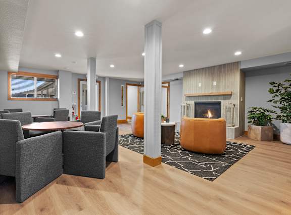a swimming pool with patio furniture and chairs around it at ALTITUDE BY VINTAGE, Reno, NV