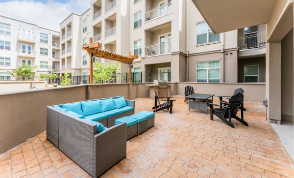 Courtyard Patio With Ample Sitting at Residences at 3000 Bardin Road, Grand Prairie, TX, 75052