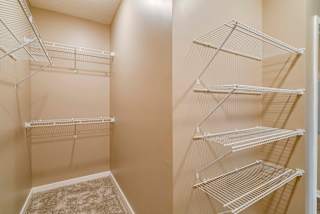 Walk in closet in master bedroom at The Flats at Shadow Creek new luxury apartments in east Lincoln NE 68520