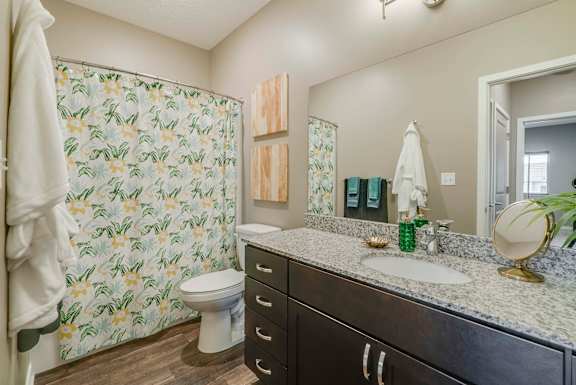 Large bathroom with granite countertop at The Flats at Shadow Creek new luxury apartments in east Lincoln NE 68520