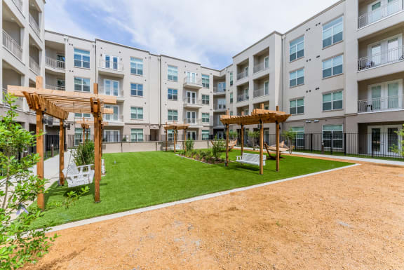 Lush Courtyards With Ample Sitting  at Residences at 3000 Bardin Road, Grand Prairie, TX, Texas, 75052