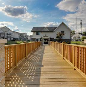Apartments in Antioch, TN 37013 for Rent – Hickory Lake - A building with a grey roof and blue doors.