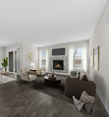 A modern living room with a fireplace and a dining table.