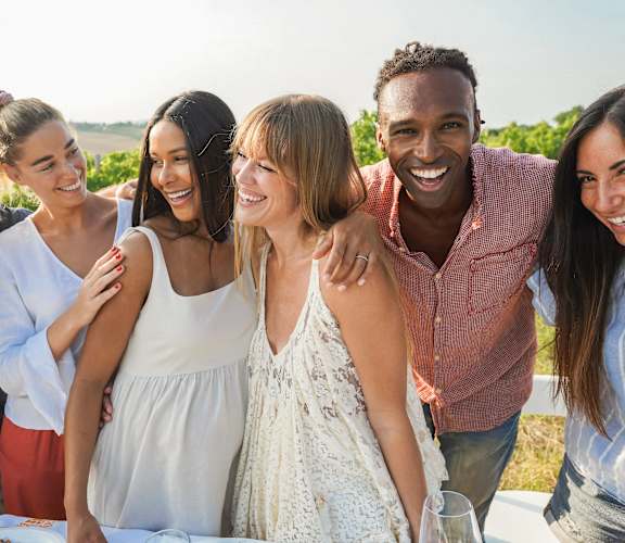 a group of people posing for a picture at a party