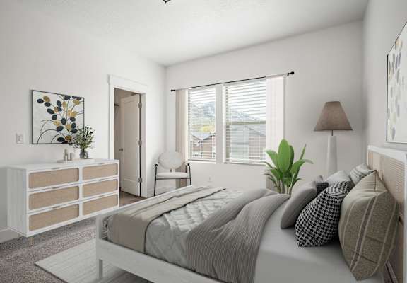 A bedroom with a large bed, a dresser, and a painting on the wall.