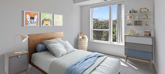 a bedroom with a bed and a large window