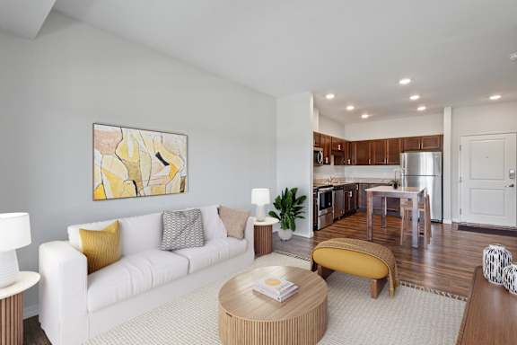 a living room with a couch and a table at EastGate Apartments, Rochester, MN, 55904