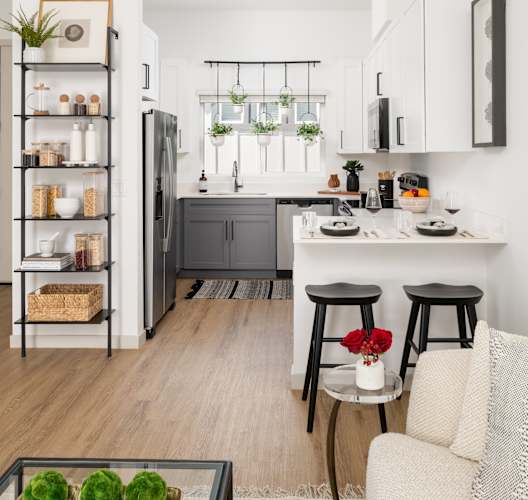 A modern kitchen with a white and black color scheme.