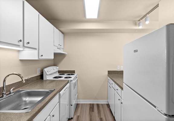 the preserve at ballantyne commons apartment kitchen with stainless steel appliances