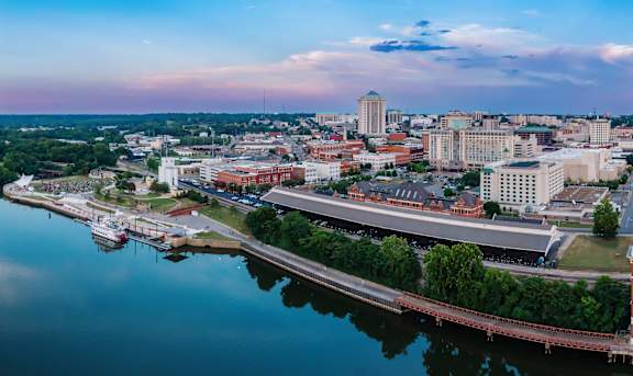 A cityscape with a river running through it.