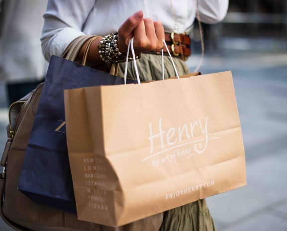 a woman carrying shopping bags
