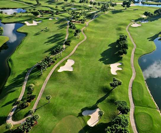 a golf course next to a body of water at Lakes at Suntree, Melbourne, Florida
