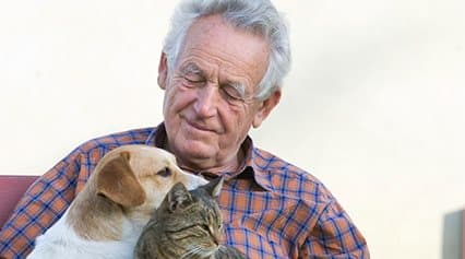 Elderly man with pets