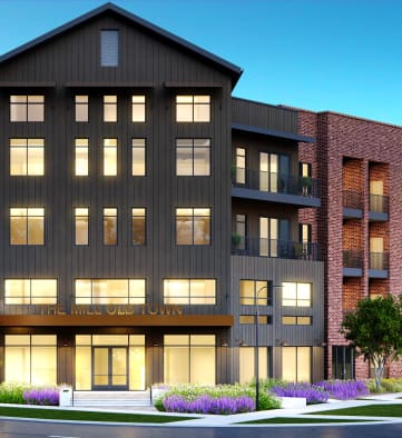 a rendering of a large apartment building with cars parked in front of it at The Mill Old Town, Lewisville, 75057