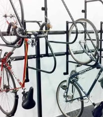 a bike rack with several bikes on it