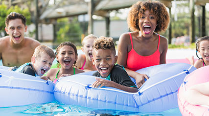 Family in swimming pool