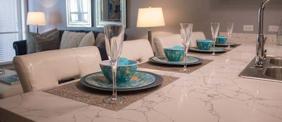 Stunning Countertops with Blue  Dish Set at the Crossings at Redlands, in California  92374