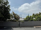 Thumbnail 11 of 44 - a basketball court next to a wall