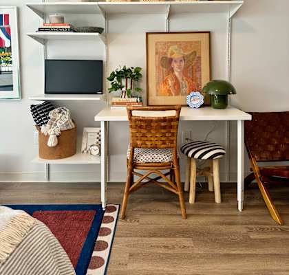 a workspace with a desk and a chair in a living room at The Teale Navy Yard, North Charleston, 29405