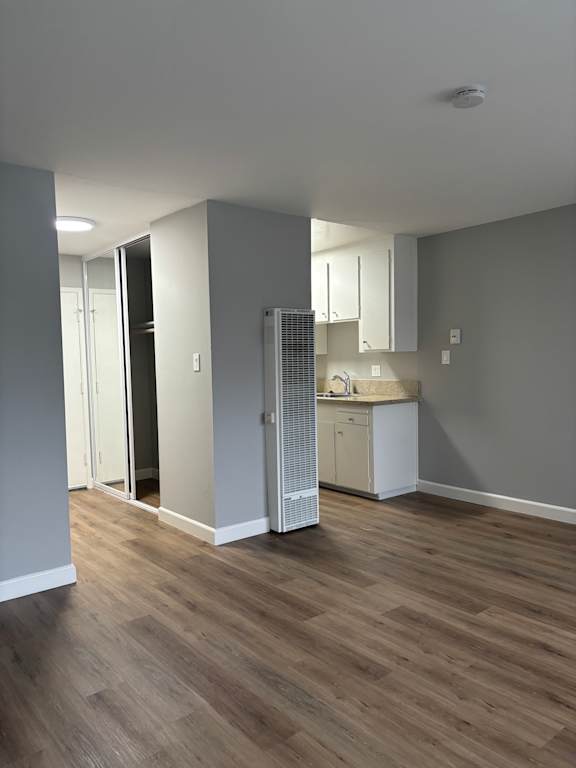 A view of a stairwell leading to a second floor.