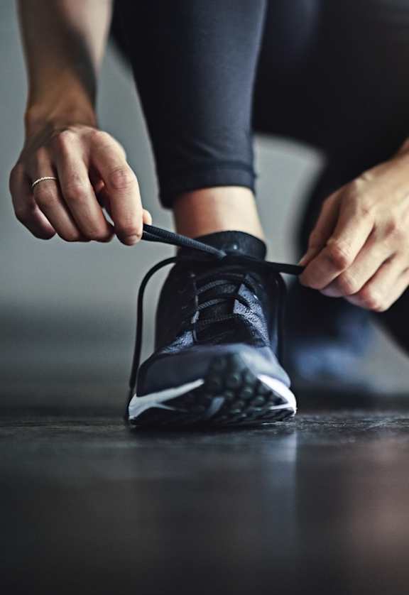 Tying Up Running Shoes at Oak Pointe Apartments in Fremont, CA 94538