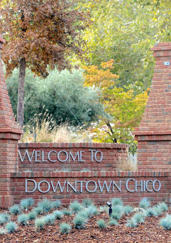 a brick entrance sign to downtown