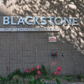 the blackstone sign on the side of a building