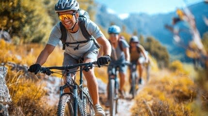 a man riding a bike through the woods