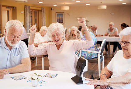 Woman celebrating after winning BINGO